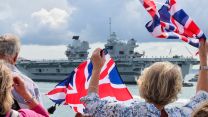 Families wave from the Round Tower as the aircraft carrier heads to the United States 01092023 CREDIT MOD.jpg