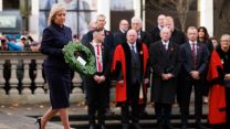 First Minister Michelle O’Neill lays a wreath during the Remembrance Sunday service at Belfast City Hall (Picture: PA)