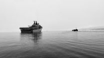 HMS Albion and a landing craft whilst deployed on NATO's Exercise Cold Response