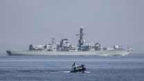 HMS Argyll in the background with a Pacific24 at sea