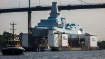 HMS Cardiff being moved to Loch Long before heading to Scotsoun