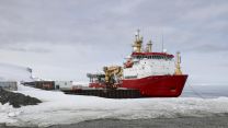 HMS Protector berthed at British Antarctic Survey research station, Rothera