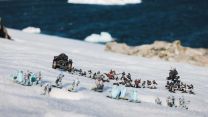 HMS Protector sailors play with Warhammer pieces in the snow11022023 CREDIT Royal Navy.jpg