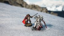 HMS Protector sailors with Warhammer pieces in the snow11022023 CREDIT Royal Navy.jpg