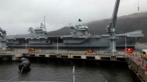 HMS Queen Elizabeth in the Firth of Clyde, Scotland, berthed at the Glen Mallan ammunition jetty