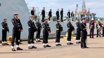 HMS Spey's guard stood at ease during the commissioning service for the vessel