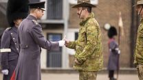	HRH Prince of Wales presents members of the 5th Royal Australian Regiment (5RAR) of the Australian Army with handmade leeks at St David's Day celebration