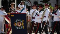 HRH takes the salute as the Colours of the Royal Gibraltar Regiment march past 09062022 CREDIT MOD Crown Copyright.jpg
