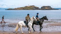 Household Cavalry exercise their horses in North Berwick after Service of Thanksgiving for King (Picture: PA NO REUSE)