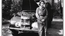 The future Queen standing in front of a vehicle during her Auxiliary Territorial Service training (Picture: Shawshots/Alamy Stock Photo).