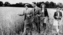 The then-Princess Elizabeth walking with her sister and parents during the Second World War (Picture: PA Images/Alamy Stock Photo). The then-Princess Elizabeth walking with her sister and parents during the Second World War (Picture: PA Images/Alamy Stock Photo).