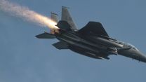 Sparks fly from an F-15 jet taking off from RAF Lakenheath (Picture: Ian Simpson).