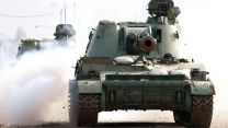 Armoured vehicles in Crimea approach Perekop checkpoint on Ukrainian border (Picture: Sergei Malgavko/TASS/ITAR-TASS News Agency/Alamy).