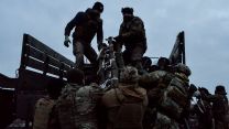 Image ID N0XC77 Ukrainian troops load 203mm Pion artillery shells into a truck after completion of a fire mission 05022024 CREDIT Sopa, Alamy EXP 23112024