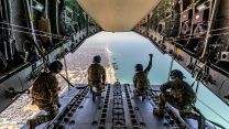 Image of RAF personnel seen here ensuring aid pallets are safely dropped from the tail lift of an RAF A400 aircraft whilst over Gaza (Picture: MOD)
