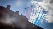 Image of the Red Arrows flypast over Edinburgh Castle in Scotland