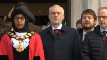 Jeremy Corbyn observes commemorations on Armistice Day in London.