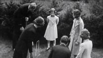 The future couple play croquet at the naval college (Picture: Crown Copyright). The future couple play croquet at the naval college (Picture: Crown Copyright).