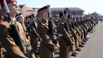 Junior soldiers standing at attention at AFC Harrogate as they graduate.