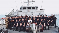 The British Formula 1 racing car driver visited sailors in Bahrain