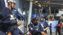 Lines are pulled across as HMS Kent conducts a replenishment at sea (RAS) with RFA Fort Victoria whilst in the Indo-Pacific region 20210818 Credit MOD Crown Copyright.jpg