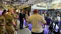 Major General James Sales and representatives of Army Sport tours the sports facilities at Loughborough University after singing a new partnership agreement which will benefit elite sporting soldiers and students alike