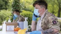 Soldiers at a mobile testing unit in Hemel Hempstead
