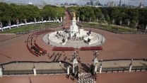 Military personnel during the Queen's coffin procession heading down The Mall