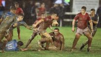 Wet and muddy conditions made it tough for the players to get to the touchline 