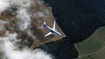 P-8A Poseidon over RAF Lossiemouth taken from above with a 100 sqn hawk from RAF Leeming 01092021 CREDIT MOD