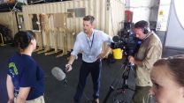 A mix of baking Arabian sun and jet fuel makes interviewing sweaty work.. 