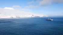 Panoramic view of the Norwegian volcanic island of Jan Mayen in the Arctic Ocean with HMS Prince of Wales near it 130422 CREDIT Royal Navy