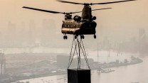 An RAF Odiham Chinook Helicopter with an underslung load over London