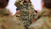 The then-Captain General of the Royal Marines, Prince Philip takes the salute from the Commando Logistics Regiment during a home coming parade in Barnstaple, Devon, November 2011.