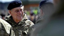Prince Philip chats with soldiers from 1 Close Support Battalion, Royal Electrical and Mechanical Engineers  at Munster Barracks, Catterick, after returning from Operation Herrick in Afghanistan, May 2013.