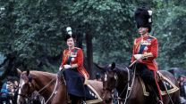 The Queen and Prince Philip during the 1963 Trooping the Colour (Picture: Michele and Tom Grimm/Alamy).