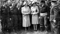 Queen Elizabeth and Princess Elizabeth standing with a group of RAF Bomber Command crews from Nos 15 and 622 Squadrons