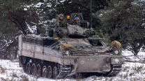 Queens Royal Hussars battlegroup soldiers battlegroup in a Warrior AFV drive during Final Training exercise 20012023 CREDIT MOD Crown Copyright.jpg