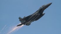 Sparks fly from an F-15 jet taking off from RAF Lakenheath (Picture: Ian Simpson).