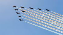 RAF Red Arrows arrived in formation performing a spaghetti break before landing at RAF Akrotiri 28092021 Credit MOD Crown Copyright.jpg