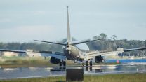 RAF new P-8A Poseidon aircraft from behind landing on NAS Jacksonville runway (Picture: MOD).