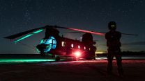 Royal Air Force CH-47 Chinook helicopter rests at night during a training mission in the Arizona desert. The chinook was being used at a FARP to refuel USMC helicopters CREDIT RAF