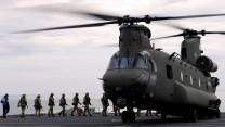 Royal Marines embarking a Chinook from RFA Lyme Bay during Ex Catamaran
