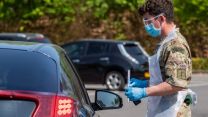 Royal Marines from 42 Commando conduct COVID19 Coronavirus testing at mobile testing unit they set up in Salisbury (Picture: MOD).