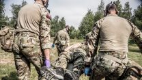Royal Marines rush a casualty to treatment areas during the Royal Navy NATO exercise 05082022 CREDIT Royal Navy.jpg