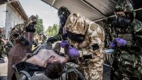 Royal Navy medics work in the decontamination area during Royal Navy NATO exercise 05082022 CREDIT Royal Navy.jpg