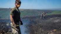 Army battle a wildfire on Saddleworth Moor