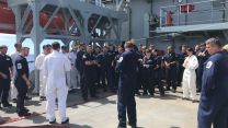 Sailors on board HMS Scott as they train to deal with fires and floods