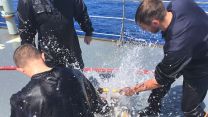 Sailors on board HMS Scott training to deal with fires and floods