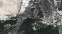 Satellite image appearing to show Russian convoy moving into forests outside Kyiv (Picture: Maxar Technologies via REUTERS).